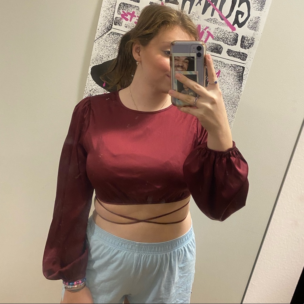 Maroon boutique crop top with open back. It is a size medium in the brand Lelis.